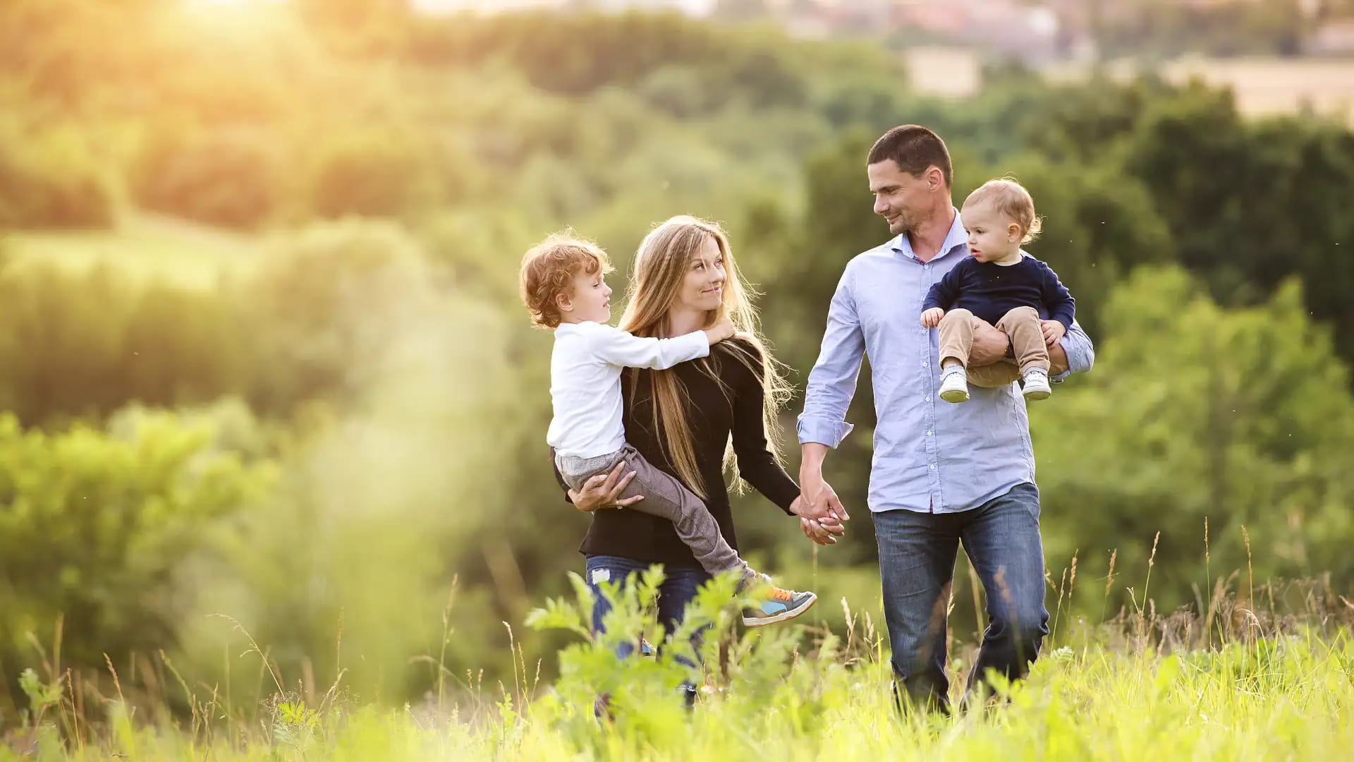 Happy family walking through park – breach of separation agreement