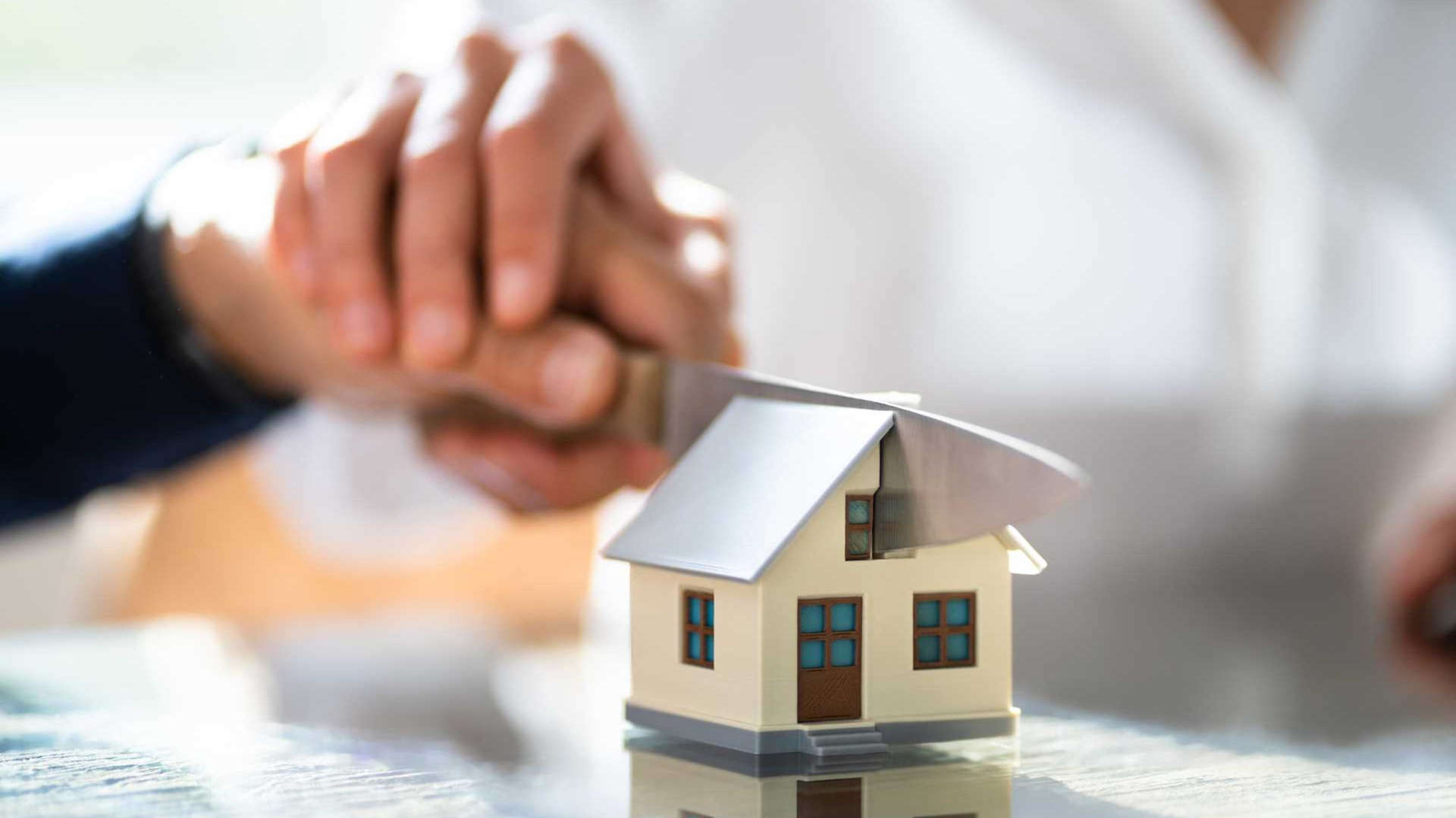 The division of assets in a divorce shown through the cutting of a relationship property